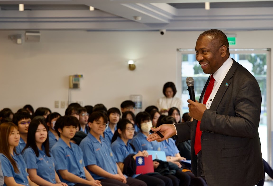 Lewis gives a talk entitled 